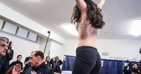 Активистка Femen разделась перед Берлускони на выборах в Италии