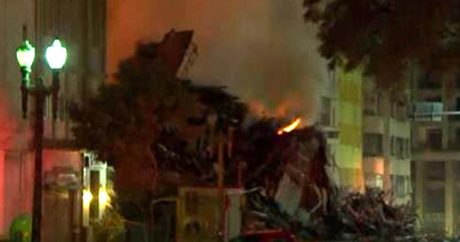 Видео: горящая многоэтажка рухнула вместе с жителями