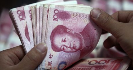 Китай резко укрепил курс юаня к доллару