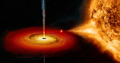 Ученые нашли уникальную «светящуюся» черную дыру