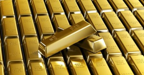 Золото подешевело на укреплении доллара